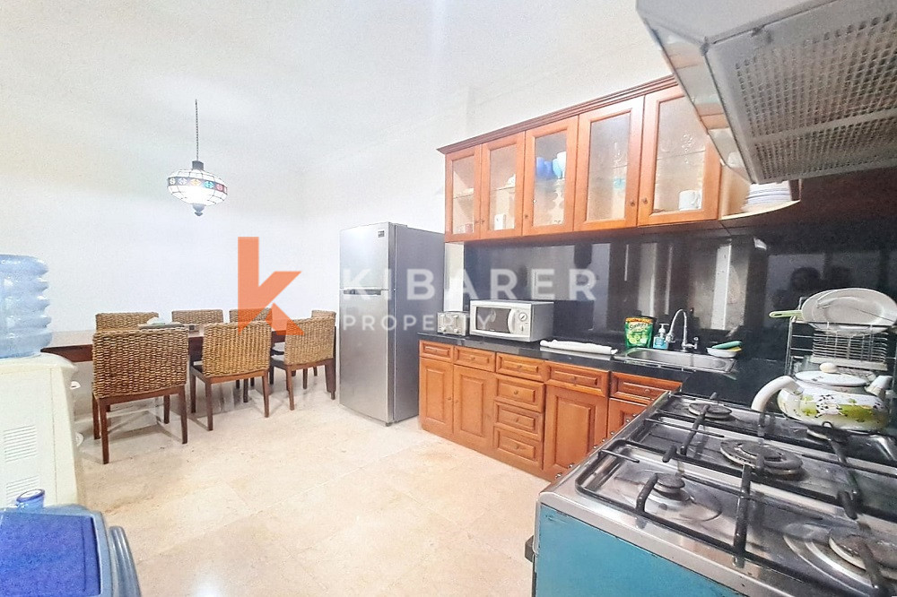 Homey Four Bedroom Classic Enclosed Living Room Villa in Kuta