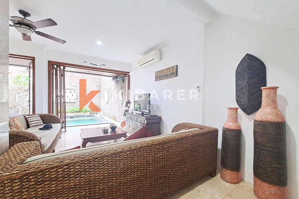 Homey Four Bedroom Classic Enclosed Living Room Villa in Kuta