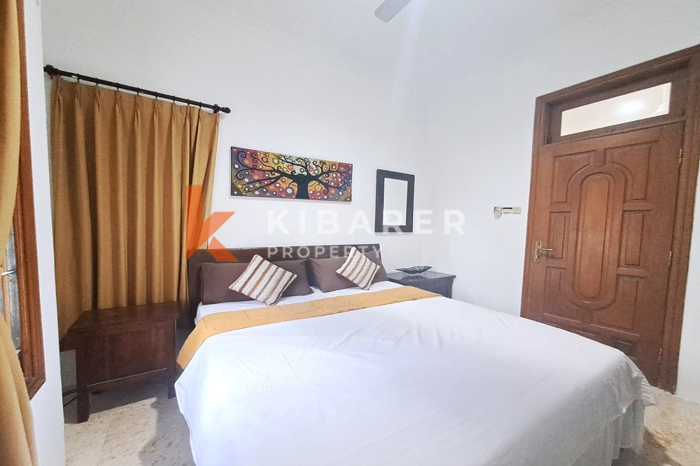 Homey Four Bedroom Classic Enclosed Living Room Villa in Kuta