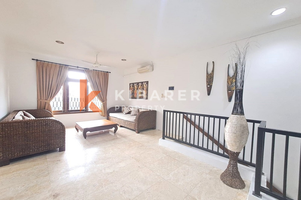 Homey Four Bedroom Classic Enclosed Living Room Villa in Kuta