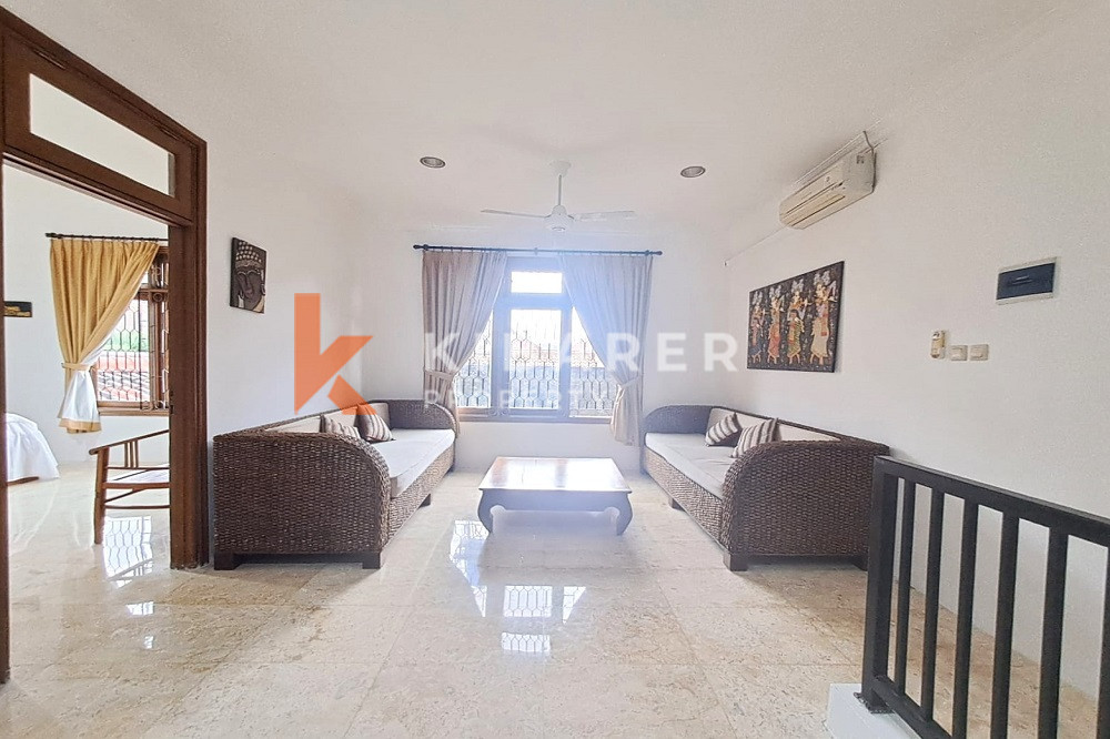 Homey Four Bedroom Classic Enclosed Living Room Villa in Kuta