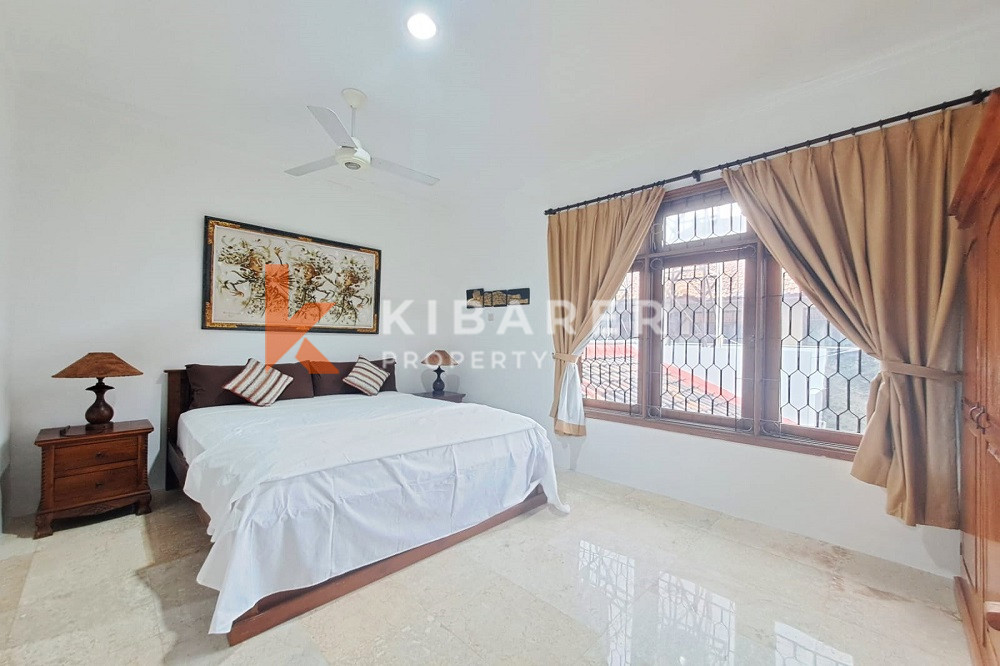 Homey Four Bedroom Classic Enclosed Living Room Villa in Kuta