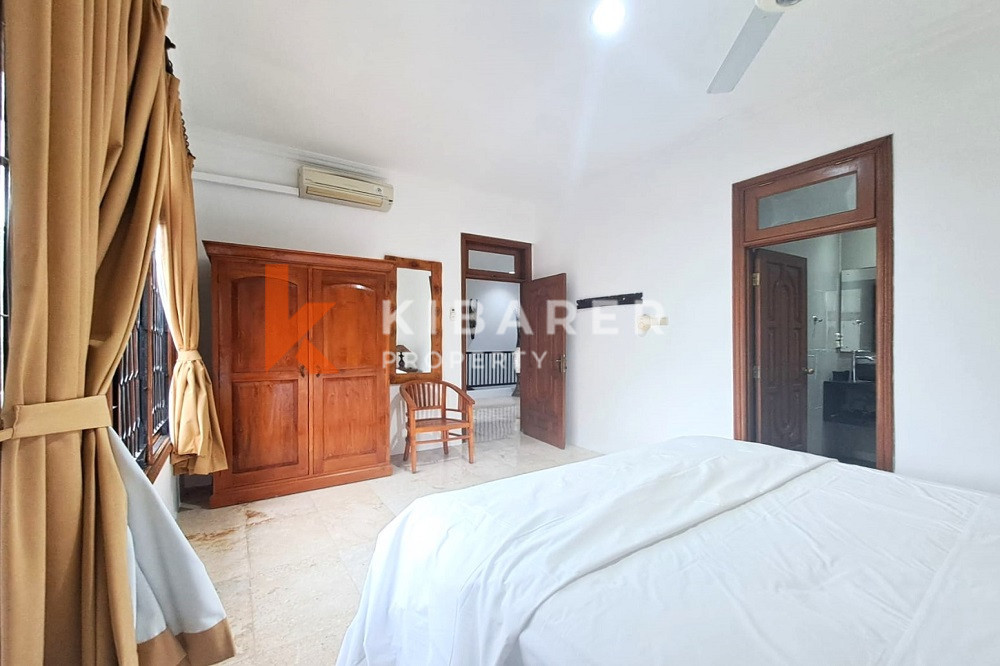 Homey Four Bedroom Classic Enclosed Living Room Villa in Kuta