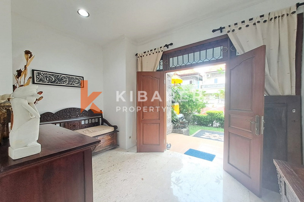 Homey Four Bedroom Classic Enclosed Living Room Villa in Kuta