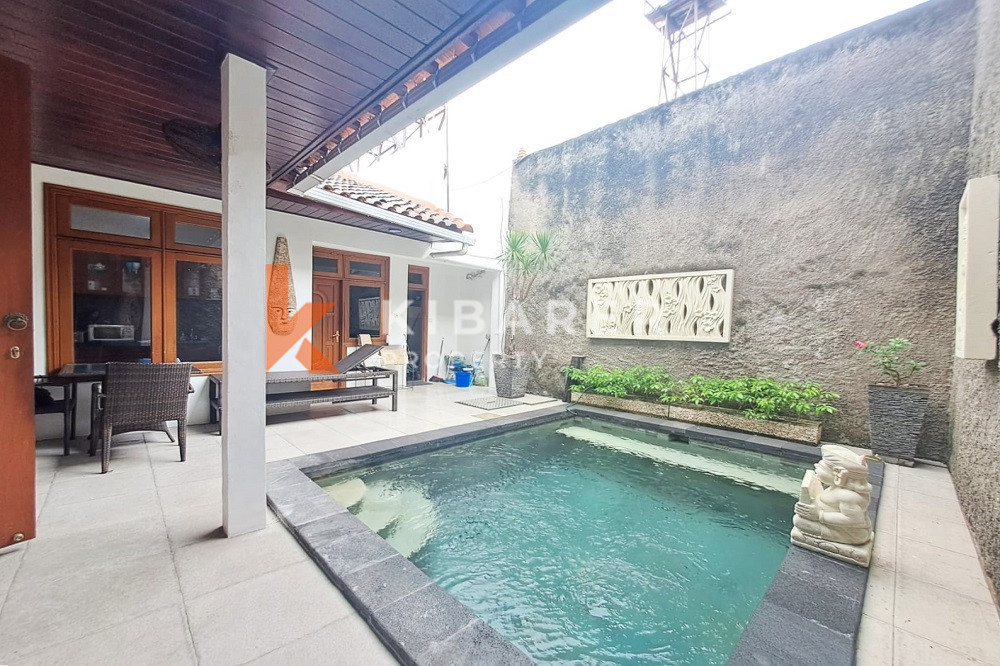 Homey Four Bedroom Classic Enclosed Living Room Villa in Kuta