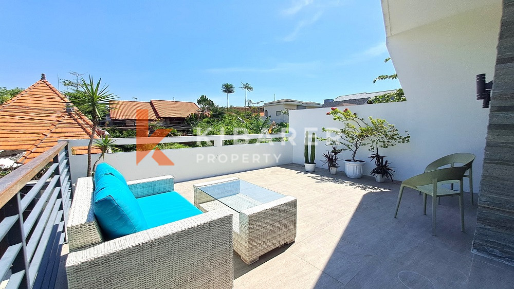 Picturesque Three Storey Three-Bedroom Villa Enclosed Living Room with Rooftop Located in Kerobokan Area