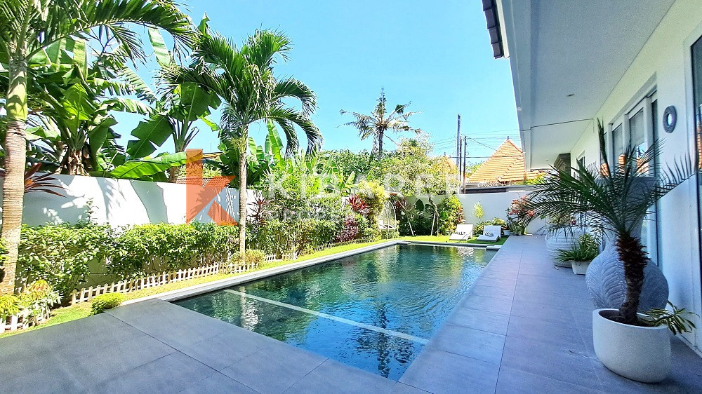 Picturesque Three Storey Three-Bedroom Villa Enclosed Living Room with Rooftop Located in Kerobokan Area