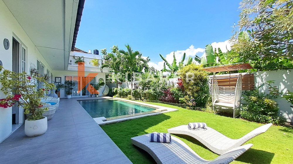 Picturesque Three Storey Three-Bedroom Villa Enclosed Living Room with Rooftop Located in Kerobokan Area