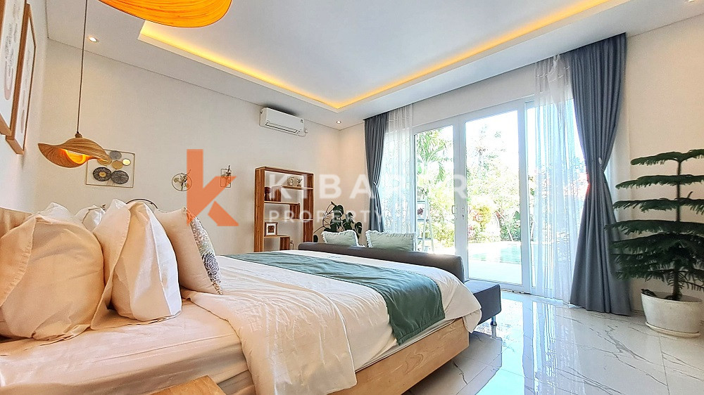 Picturesque Three Storey Three-Bedroom Villa Enclosed Living Room with Rooftop Located in Kerobokan Area