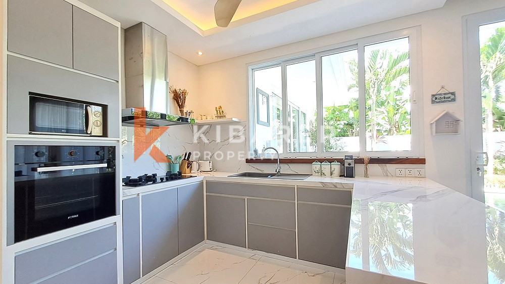 Picturesque Three Storey Three-Bedroom Villa Enclosed Living Room with Rooftop Located in Kerobokan Area