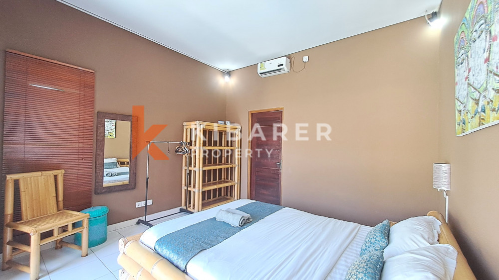 Homey Two-Bedroom Fully Furnished with Spacious Garden Open Living Villa Located in Ungasan