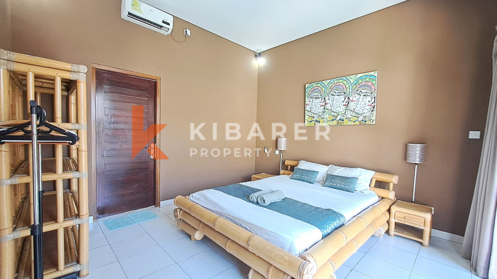 Homey Two-Bedroom Fully Furnished with Spacious Garden Open Living Villa Located in Ungasan