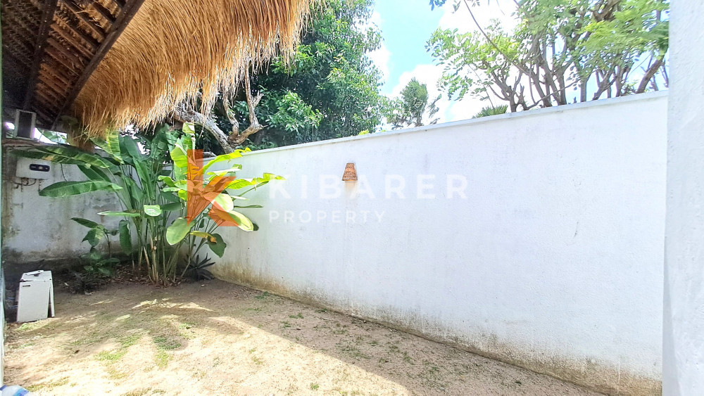 Homey Two-Bedroom Fully Furnished with Spacious Garden Open Living Villa Located in Ungasan